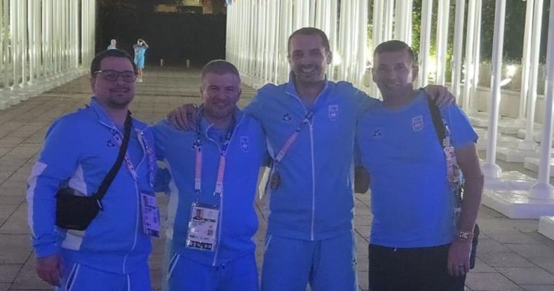 Los pergaminenses Alvaro Rosset y Diógenes Albani junto a Cristian Roldán y Walter Pérez, campeón olímpico en Beijing 2008 y también integrante del COA.