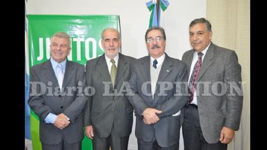 Omar Pacini, Gustavo Bitar, Guillermo Castro y Carlos Laguía, los cuatro protagonistas del acto de ayer. (LA OPINION)